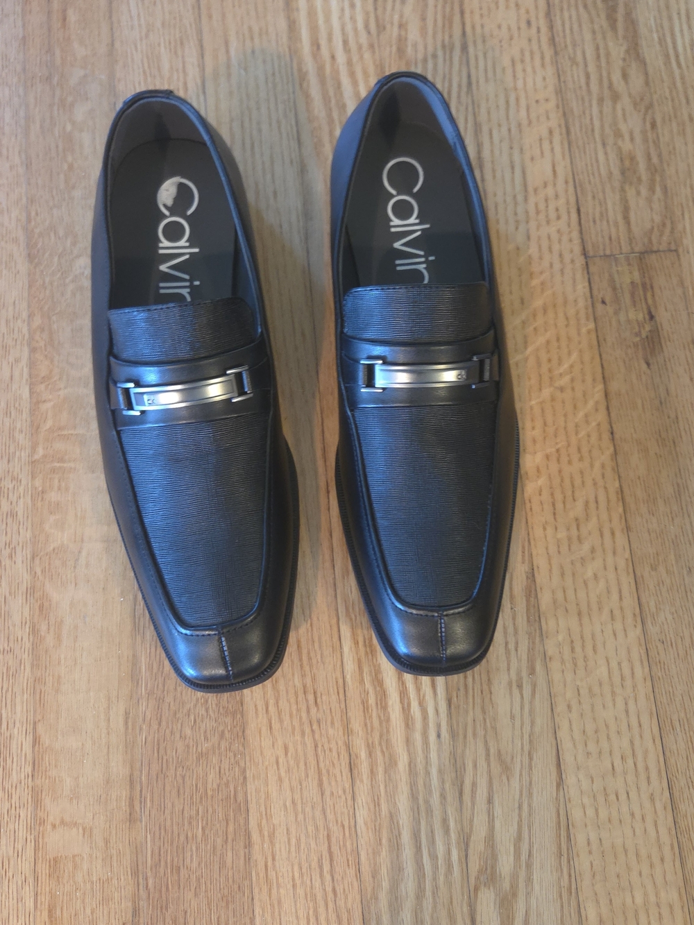 Calvin Klein Men's Black Leather Slip-On Loafers with Silver Bit